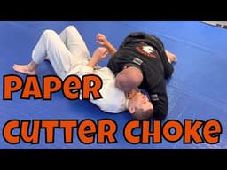 Paper cutter choke